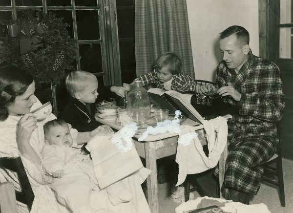 Pete writing with family-cropped